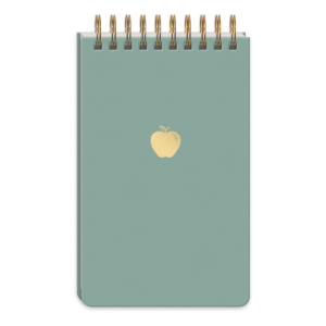 Apple-themed spiral notepad, great for jotting down lesson plans.