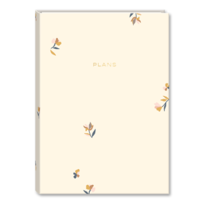 Cream undated planner with ditsy patterns, ideal for organizing your schedule.
