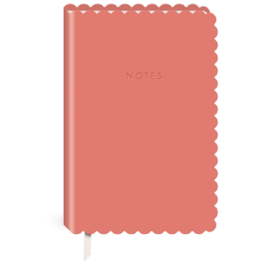 Coral softcover journal, ideal for creative note-taking.