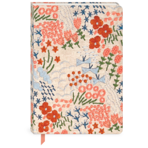 Multi-embroidered fabric journal, great for stylish note-taking.